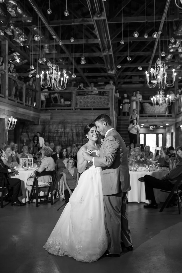 "Before going to try on dresses, I knew that I wanted a strapless ball gown," Sarah says. She wore an ivory David Tutera dress with beading and lace appliques—exactly what she wanted.