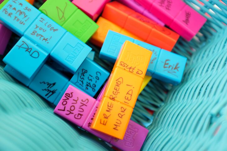 Guests signed their well wishes onto colorful Tetris blocks for the unique, game inspired guest book.