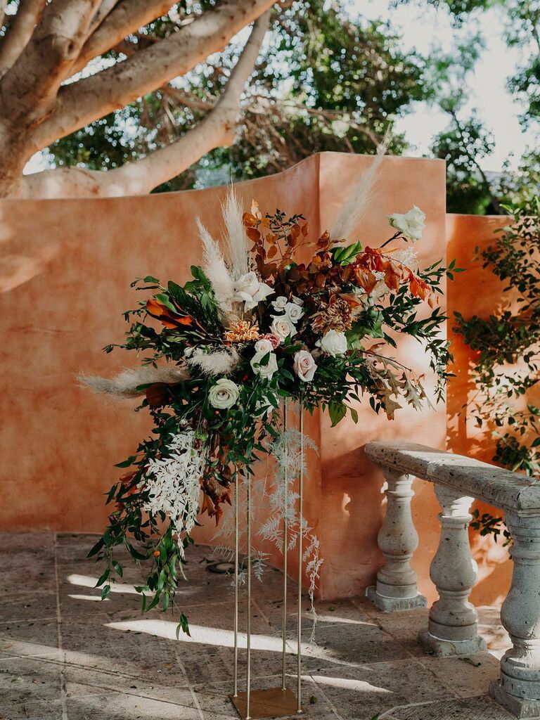 Warm neutral floral arrangement at wedding