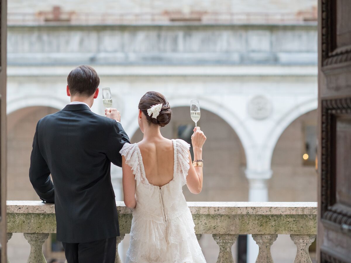 Bride and groom toasting with champagne 