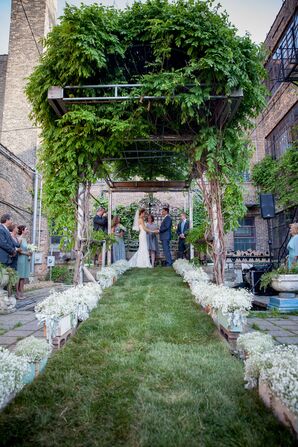 Lush Foliage Canopy Wedding Arch