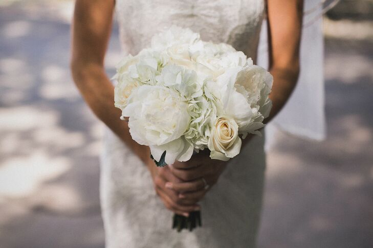 Nicole walked down the aisle carrying a white bouquet with peonies, roses and hydrangeas.