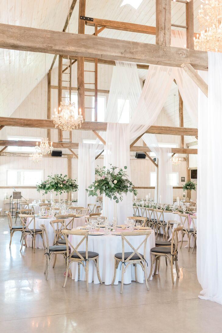 Romantic Barn Reception with Wood Beams and Draping