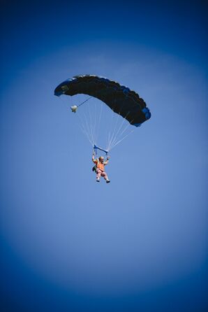 Groom Parachuting Into Wedding Ceremony