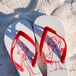 To keep their guests feet comfortable and ready for a night filled with dancing, Jenny and Josh gifted their guests personalized flip flops.