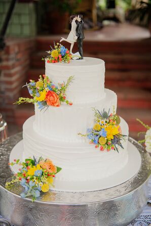 White Wedding Cake With Colorful Flowers