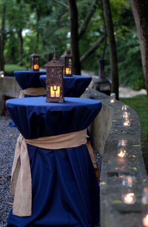 Navy Outdoor Cocktail Tables with Glowing Lanterns