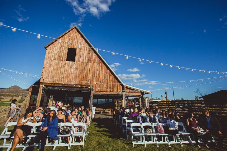 The outdoor ceremony took place outside of the rustic barn at Brasada Ranch in Powell Butte, Oregon.