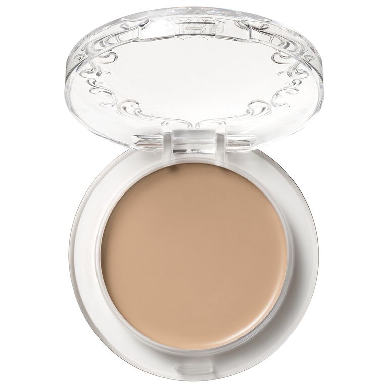 Foundation balm in a round cannister. 
