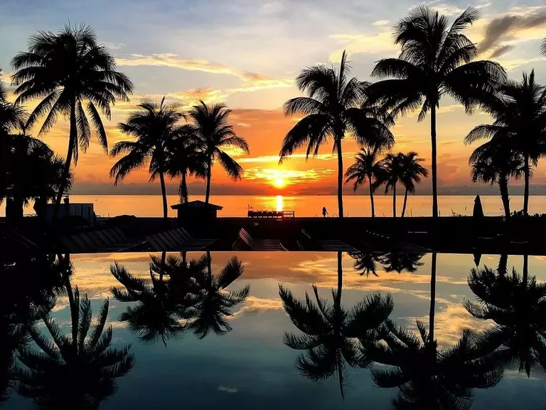 Ocean front resort at sunset