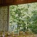 Long Reception Table With Neon Yellow, Candles and Colorful Low Centerpieces