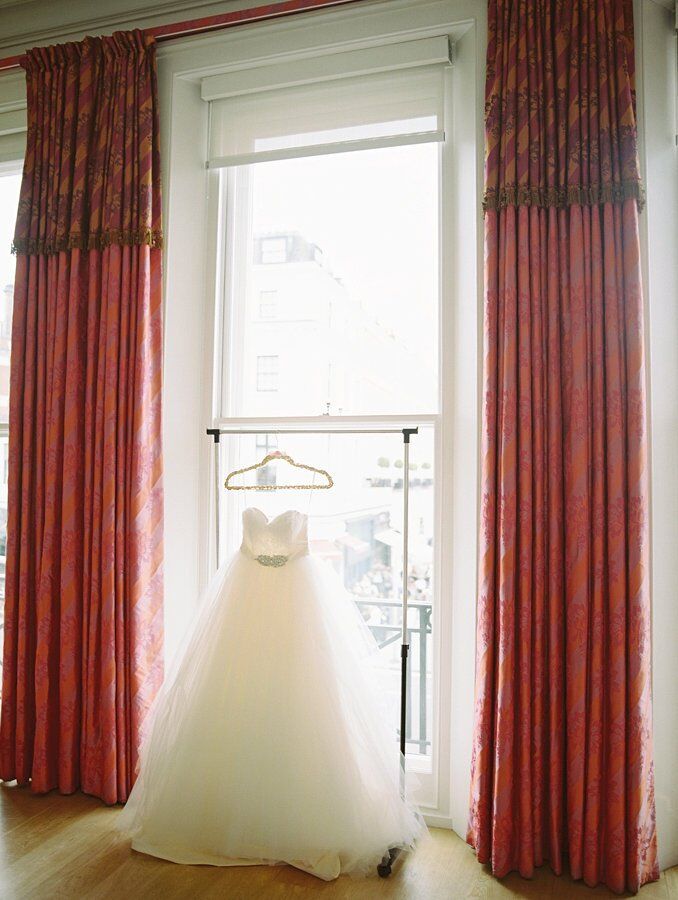 Rebecca wore an ivory strapless ball gown with a lace and organza ruched bodice, full tulle skirt and a detachable beaded sash.