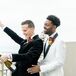 Grooms in Two Different Tuxedo Styles Pop Champagne on San Francisco Rooftop