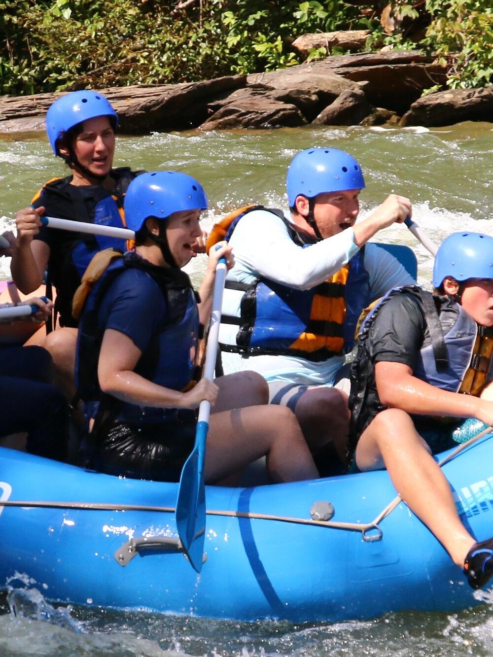 John took Alice white-water rafting down the Ocoee River. “You’ll be fine,” he said… just as he tried to give her a gentle nudge off the raft. You can see the difference in personalities perfectly in this picture: John shouting “Yeeaaah!” loving every second, and Alice… well, let’s just say she’s terrified.