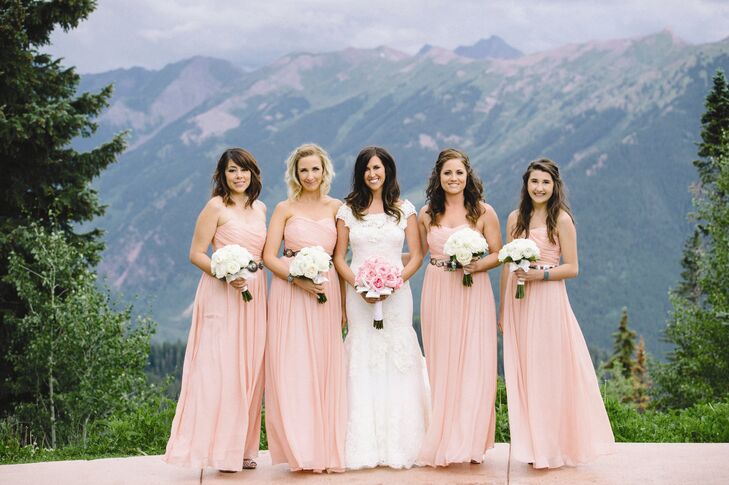 The bridesmaids wore flowing, floor-length pink gowns from J. Crew.