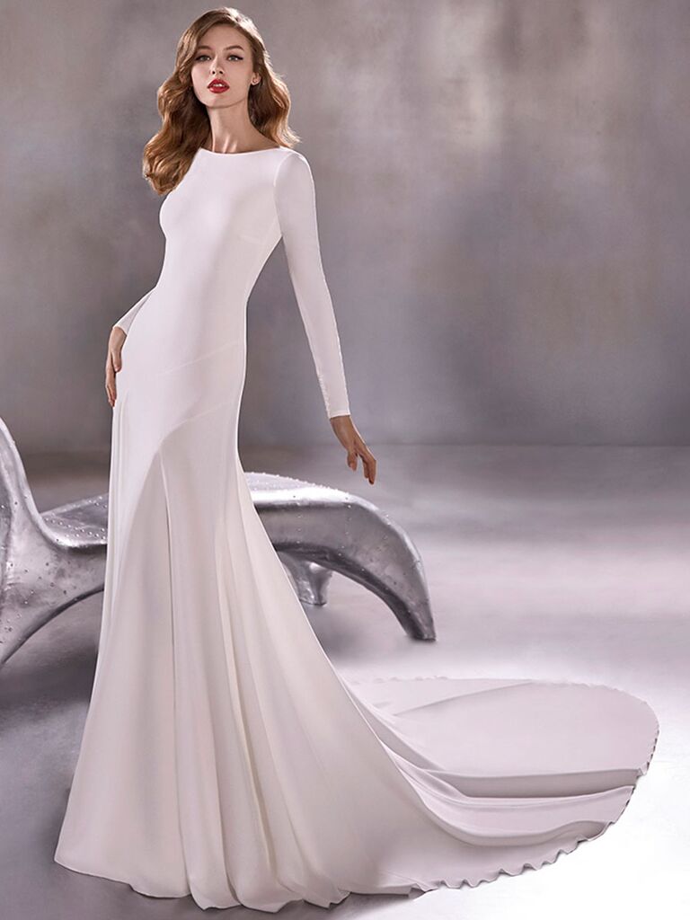 Atelier Provonias wedding dress lone sleeve trumpet gown with open back