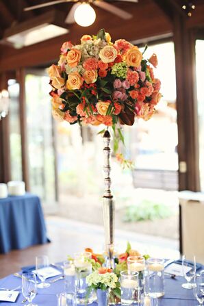 Lush Silver Pedestal Orange Flower Arrangements