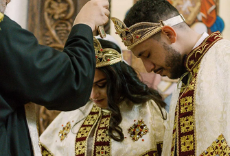 A couple receive a wedding blessing during a traditional Coptic ceremony.