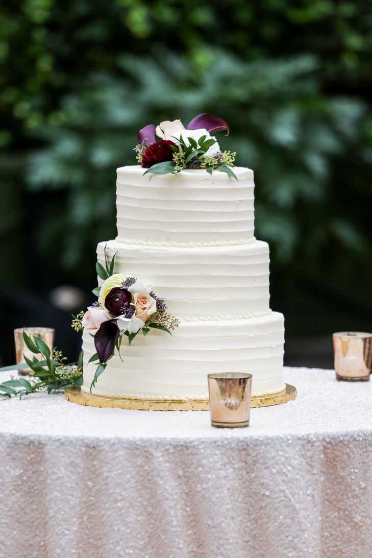 The elegant three-tier cake was gluten-free carrot cake.
