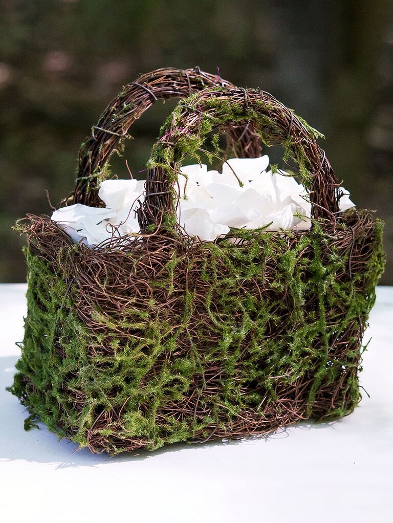faux moss and wicker flower girl basket