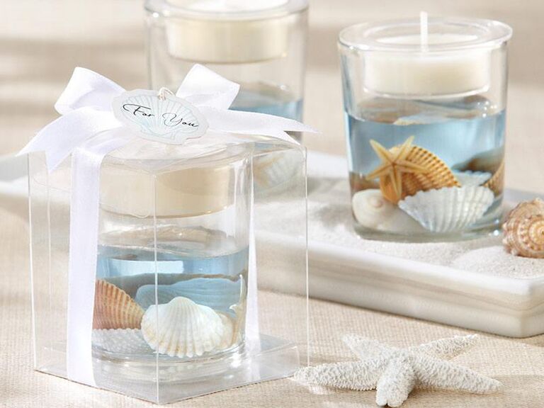 Beach themed tea light holders with seashells and ocean-blue gel