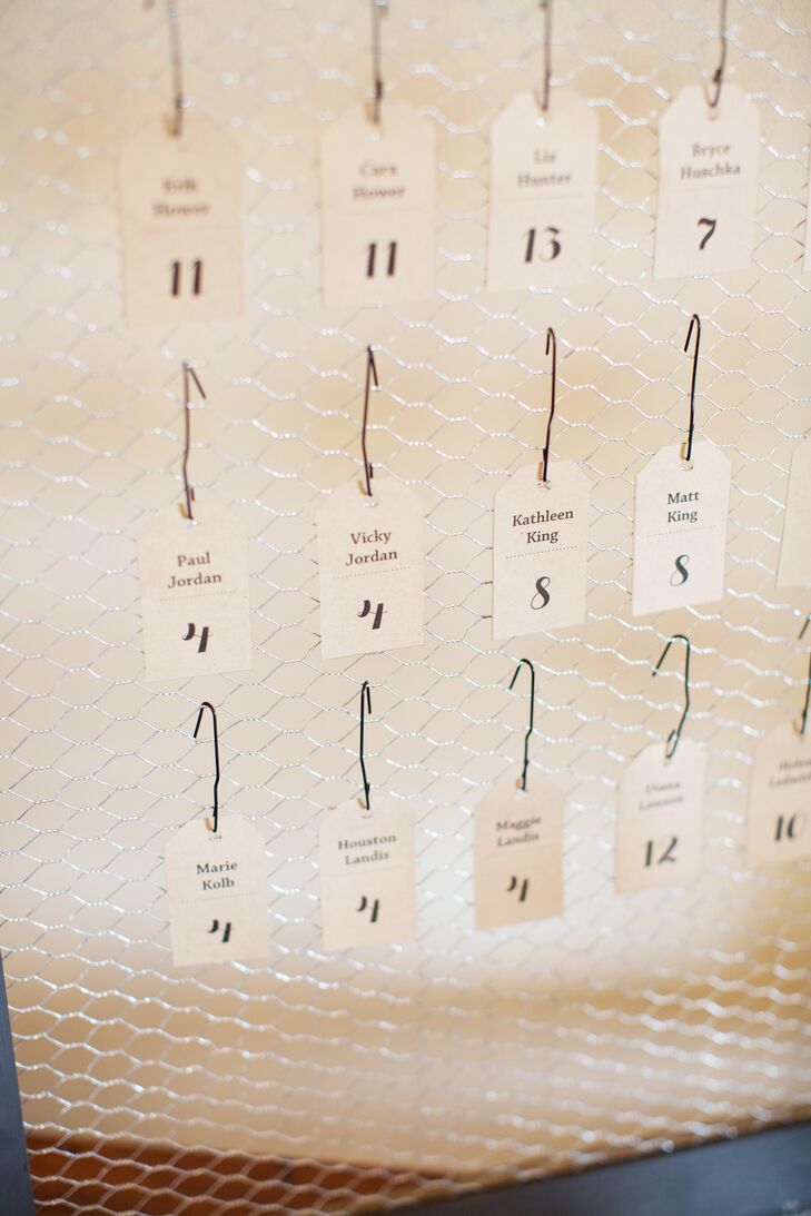 Bernadette created the escort cards, which were hung on framed wire mesh. A talented graphic designer, she also designed the wedding invitations, ceremony brochure, chalkboard menu  and place settings for the head table.