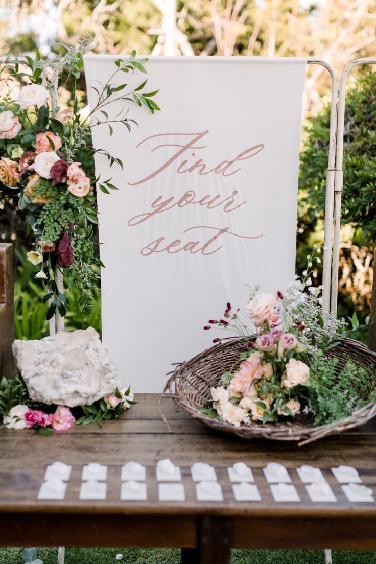 Fabric sign as part of escort card display