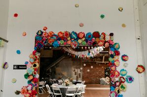 Reception Entry Covered in Bright, Colorful Paper Flowers