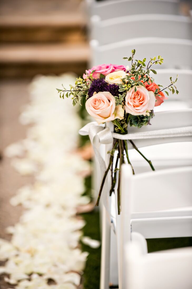 Achieving Lauren and Phil's vision for an elegant, romantic affair was an effortless exercise with Blossom Floral and Rose Petal Events on their side. The talented teams transformed the Garland’s Beverly Park into a dreamy, romantic scene, lining the aisle with ivory rose petals and bouquets of blush, pink and coral roses.