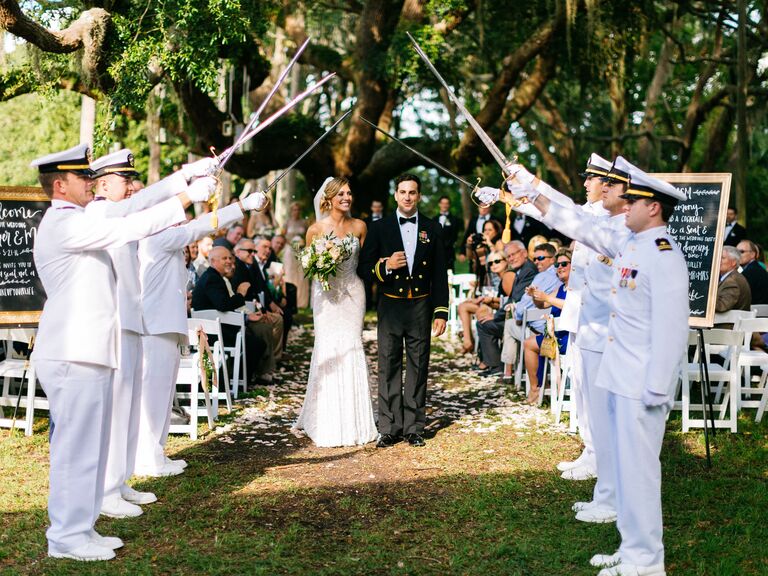 Military saber arch as a wedding send-off idea.