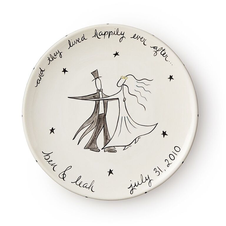 Painted platter featuring the name of the couple and the date of their wedding. Best gifts for newlyweds 2023.  