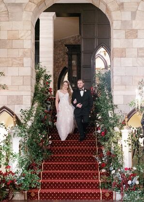 Bride and Groom Descending Estate Stairs, Red Carpet, With Cascading Flower Arrangements