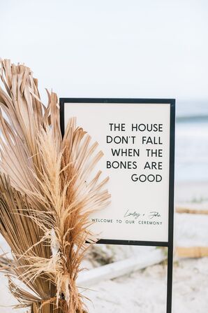 Bohemian Floral Arrangement With Black-and-White Wedding Signage