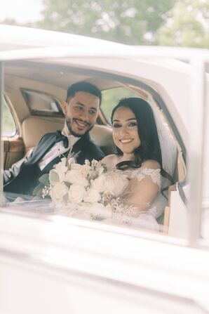 Couple in Vintage White Getaway Car During Wedding in Nashville, Tennessee