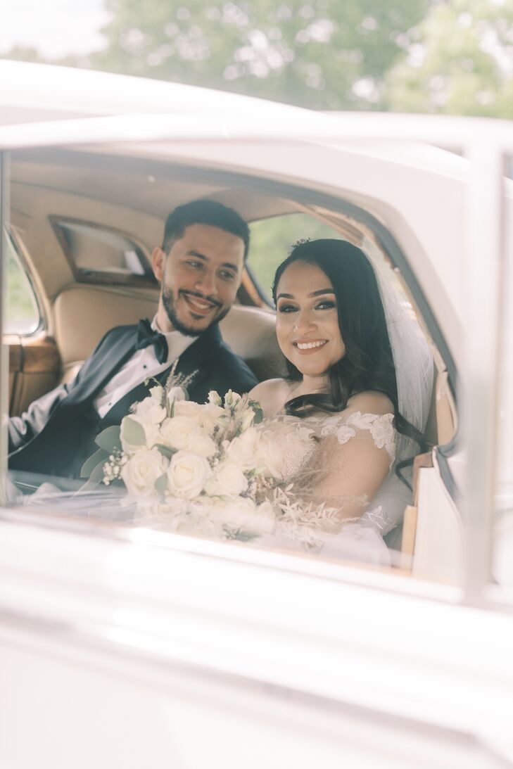Couple in Vintage White Getaway Car During Wedding in Nashville, Tennessee