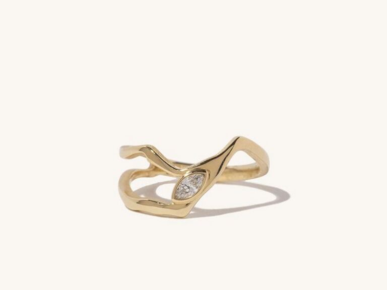 pear shaped diamond in organic yellow gold setting