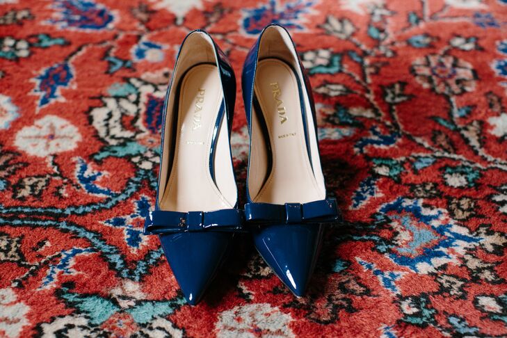 "I fell in love with the Prada shoes on first sight," Nina says. "Originally I didn’t think they were bridal enough, but then with the nudge of a girlfriend, I decided they could be my something blue. I absolutely loved the blue, patent leather and was happy to invest in them since they were versatile and could definitely be worn again and again."