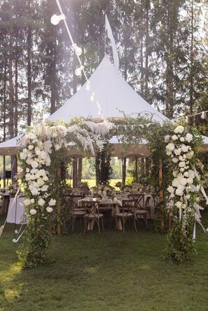 White Rose Flower Arch at Sailcloth Tent Entrance
