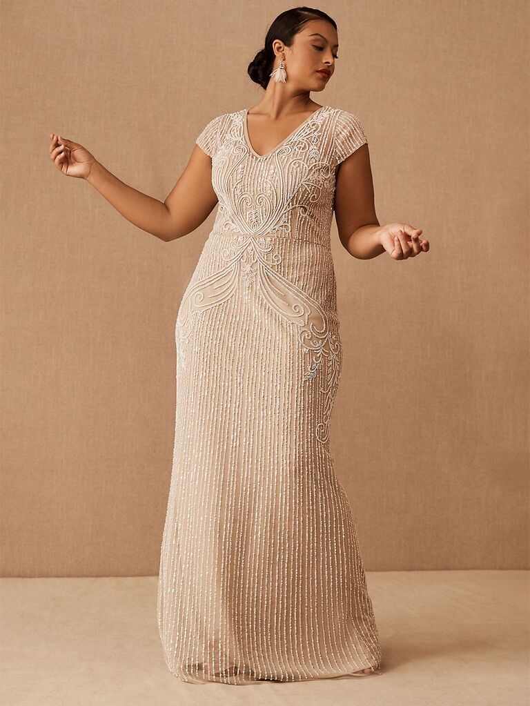 Beaded champagne floor length dress with v-neck and cap sleeves