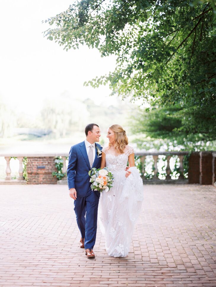 The Newlyweds Posing With a Tweedia, Mint, Lamb's Ear and Dusty Miller Bouquet