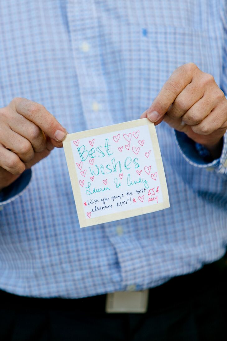 This was no ordinary guest book. Rather than asking guests leaving notes on a poster, card or page, friends and family members signed a fabric square that would eventually be sewn into a quilt.