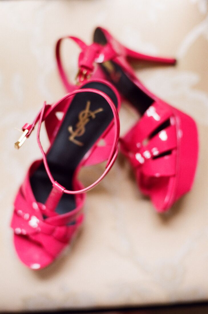 Hot pink, strappy YSL sandals added a pop of color to the bride's gown.