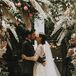 Romantic Couple with Roses, Pampas Grass and Delphiniums