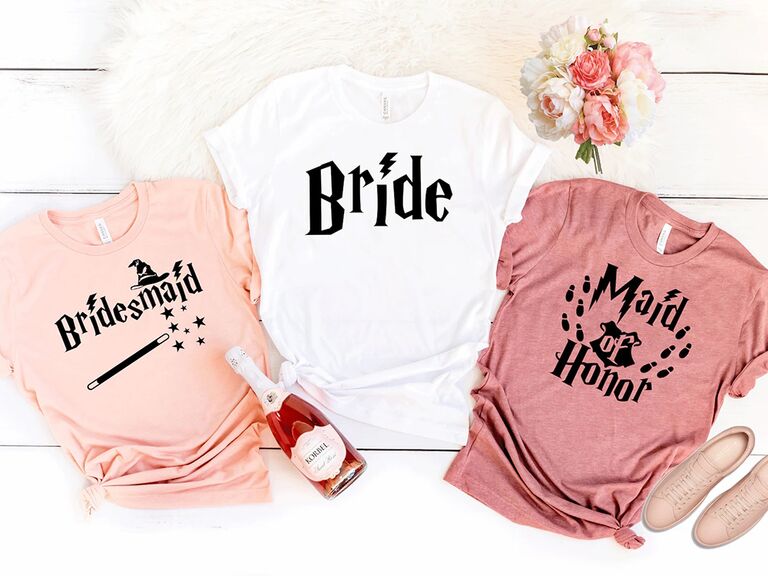 HP themed t-shirts in blush colors and white for the bride with lightning bolt and wand graphics