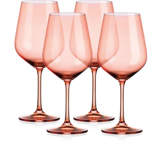 Coral-colored wine glass gift idea for 35th anniversary gift. 