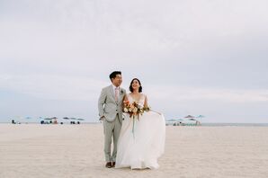 Couple at Beach Wedding in at The Boardwalk Cafe at Sunny Atlantic Beach Club in Atlantic Beach, New York