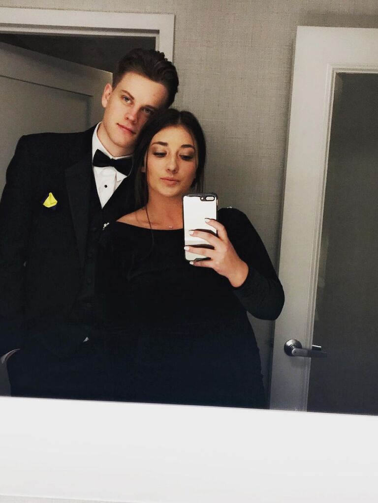 Joe and Olivia pose for a mirror selfie. 