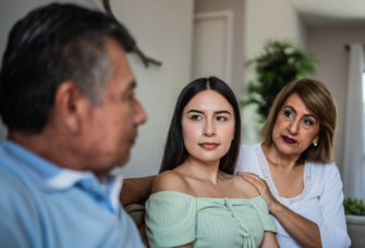 daughter talking to parents about engagement