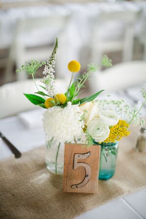 Yellow and White Centerpiece with Craspedia and Ranunculus