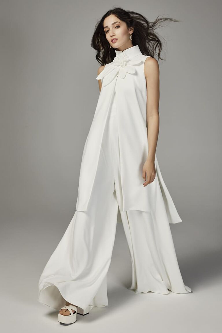 Model wears an outfit by Spanish Designer Jesus Peiro. 